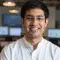 Portrait of Arjun Shenoy, Co-Founder and CPO of GetXEO